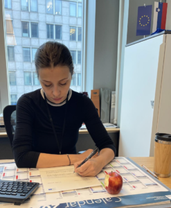 MEP Joveva signing the letter to the CEO of Apple.